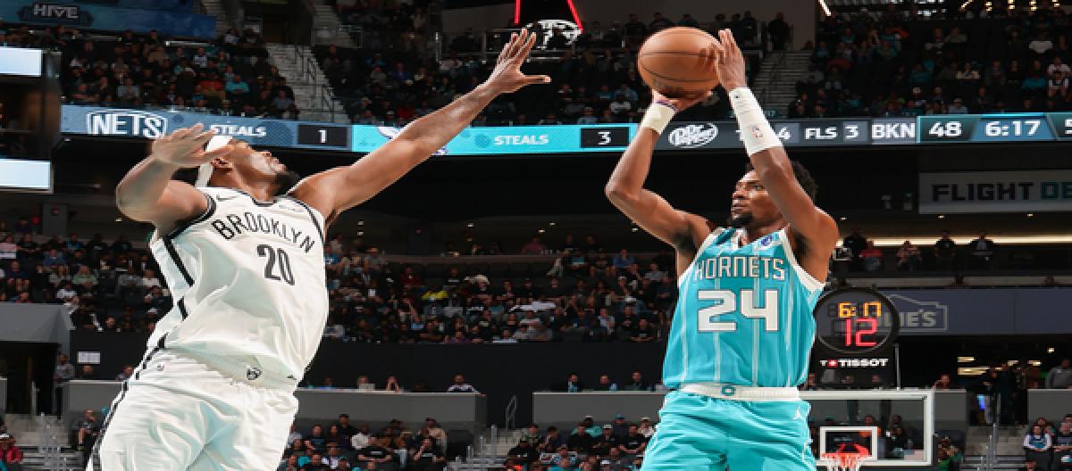 Miller returned and scored 25 points as the Hornets defeated the Nets 136-117 to start their season.