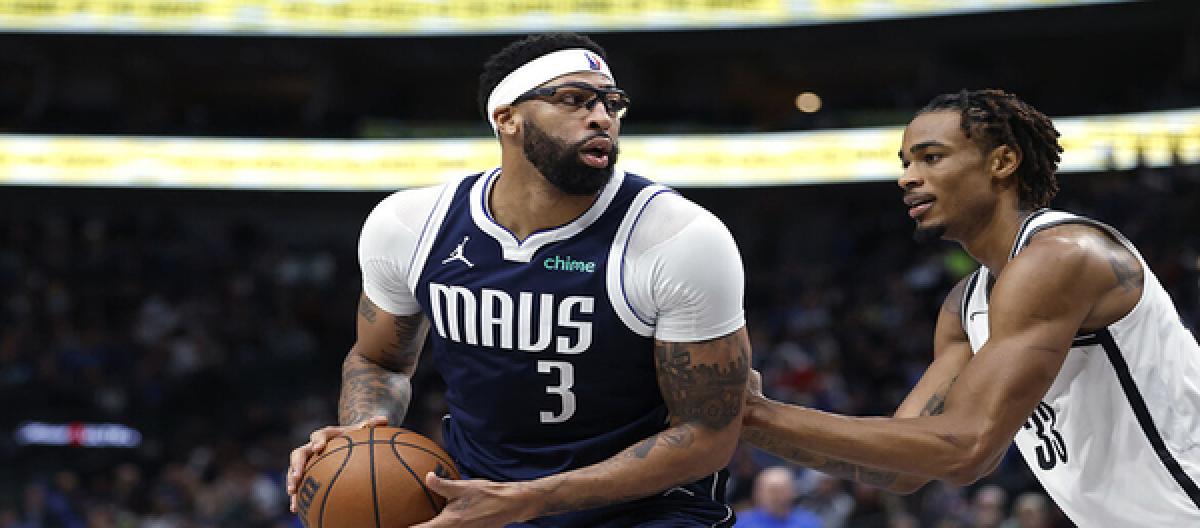 Porter's 34 points weren't enough to save the Mavericks from a narrow 119-111 victory over the Nets.