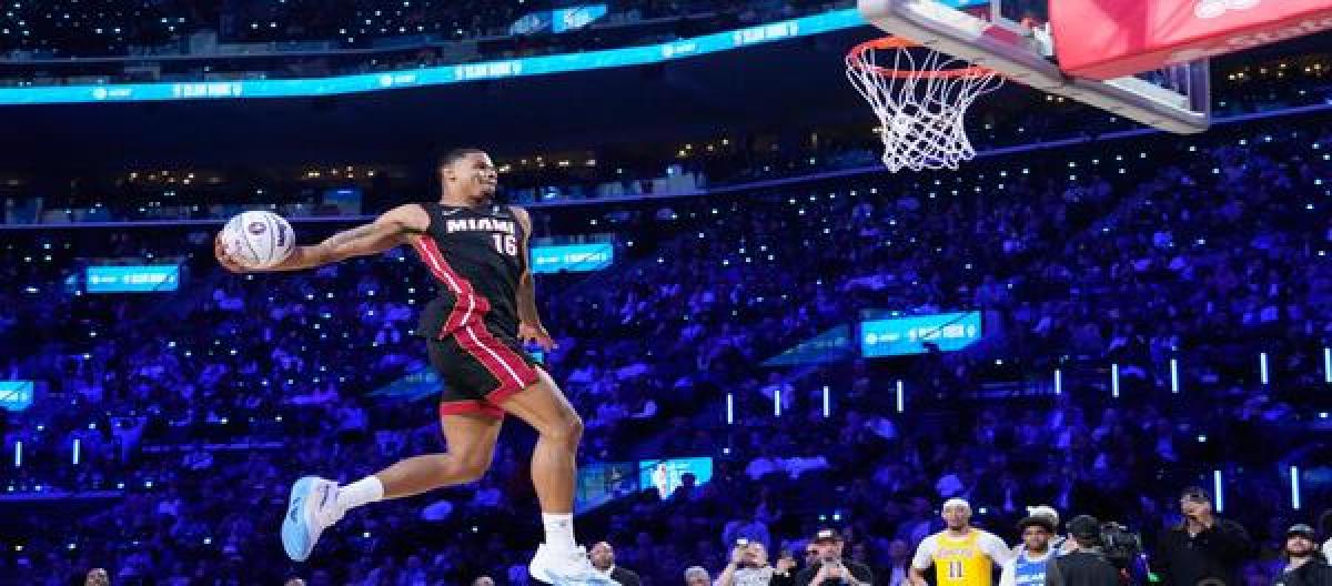 Keisha Johnson narrowly defeats Carter Bryant to win the Slam Dunk Contest.