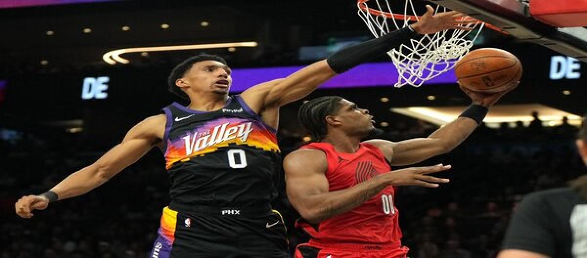 Grant and Klingon each scored 23 points as the Trail Blazers defeated the Suns 92-77.