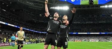 欧冠联赛——2比1战胜皇家马德里　阿申纳闯进半决赛