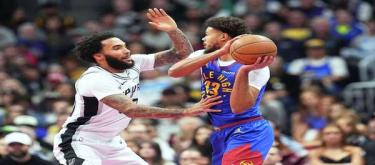 Vassell scores 35 points as Spurs narrowly defeat Nuggets 139-136.