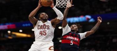 Mitchell's 48 points helped the Cavaliers stage a 130-126 comeback victory over the Wizards.