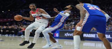 Embiid scored 28 points and George added 23, as the 76ers easily defeated the Wizards 131-110.