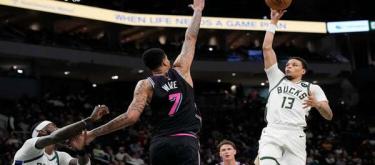 Porter exploded for 32 points in the final quarter, leading the Bucks to a 128-117 comeback victory over the Heat.