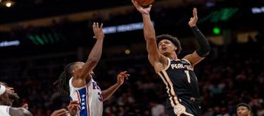 Johnson's 35-point performance led the Hawks to a 125-116 victory over the 76ers.