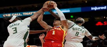 麦科勒姆30分闪亮全场 老鹰以122-99轻取雄鹿